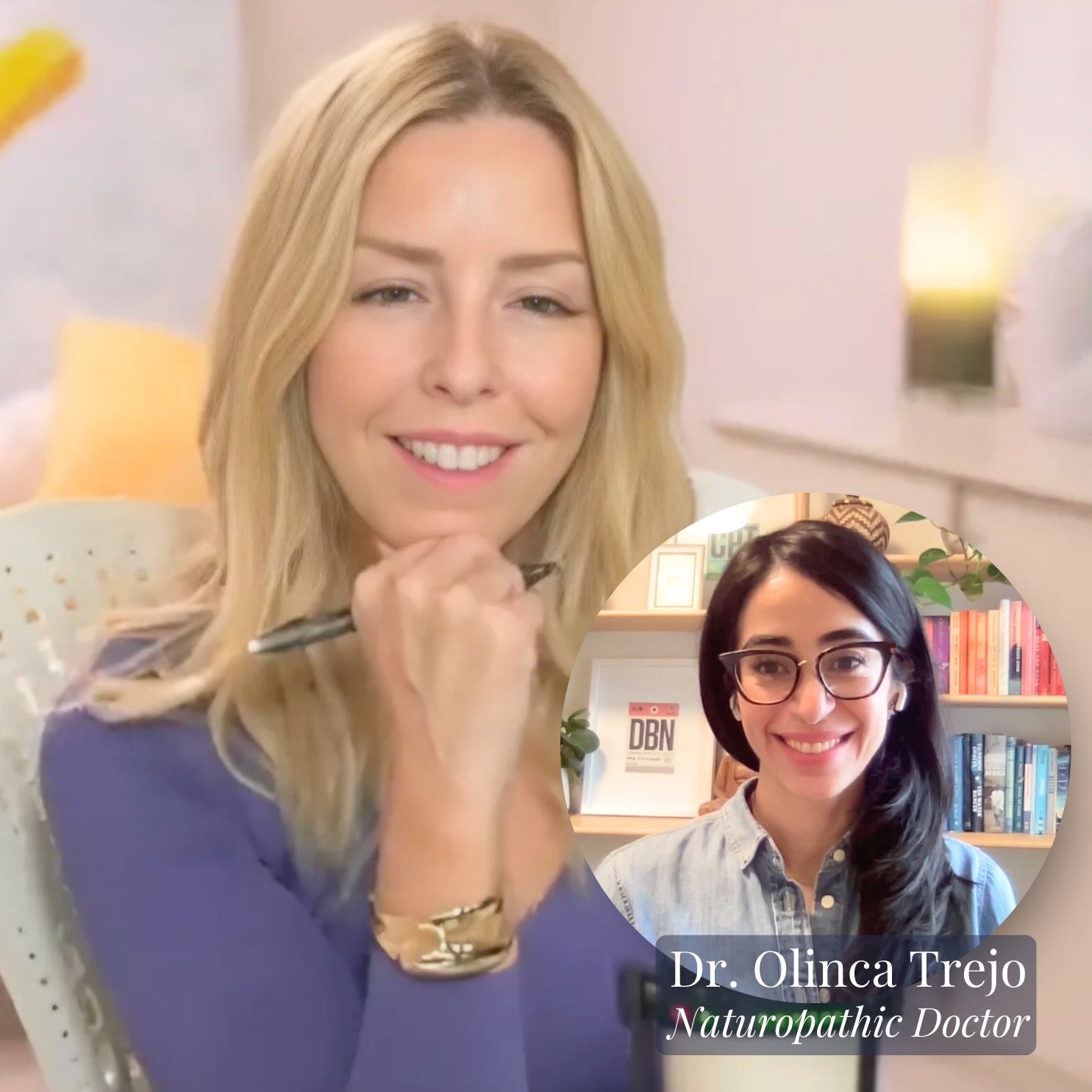 Split-screen image of Gina Livy smiling while holding a pen during a virtual conversation with Dr. Olinca Trejo, a naturopathic doctor, shown in a circular frame overlay. Dr. Trejo is smiling, wearing glasses and a denim shirt, with a bookshelf in the background.